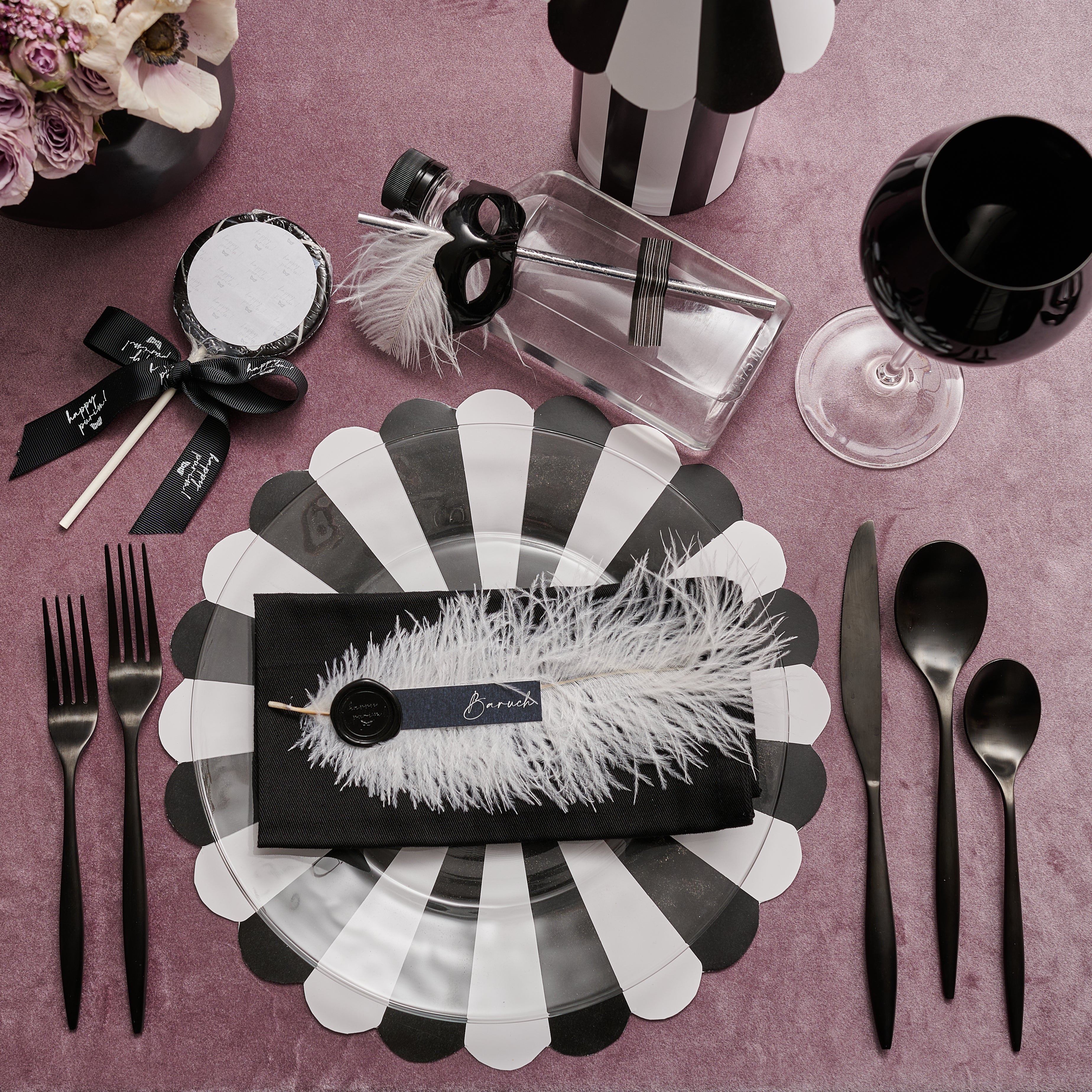 Feathery place cards with Purim wax seal