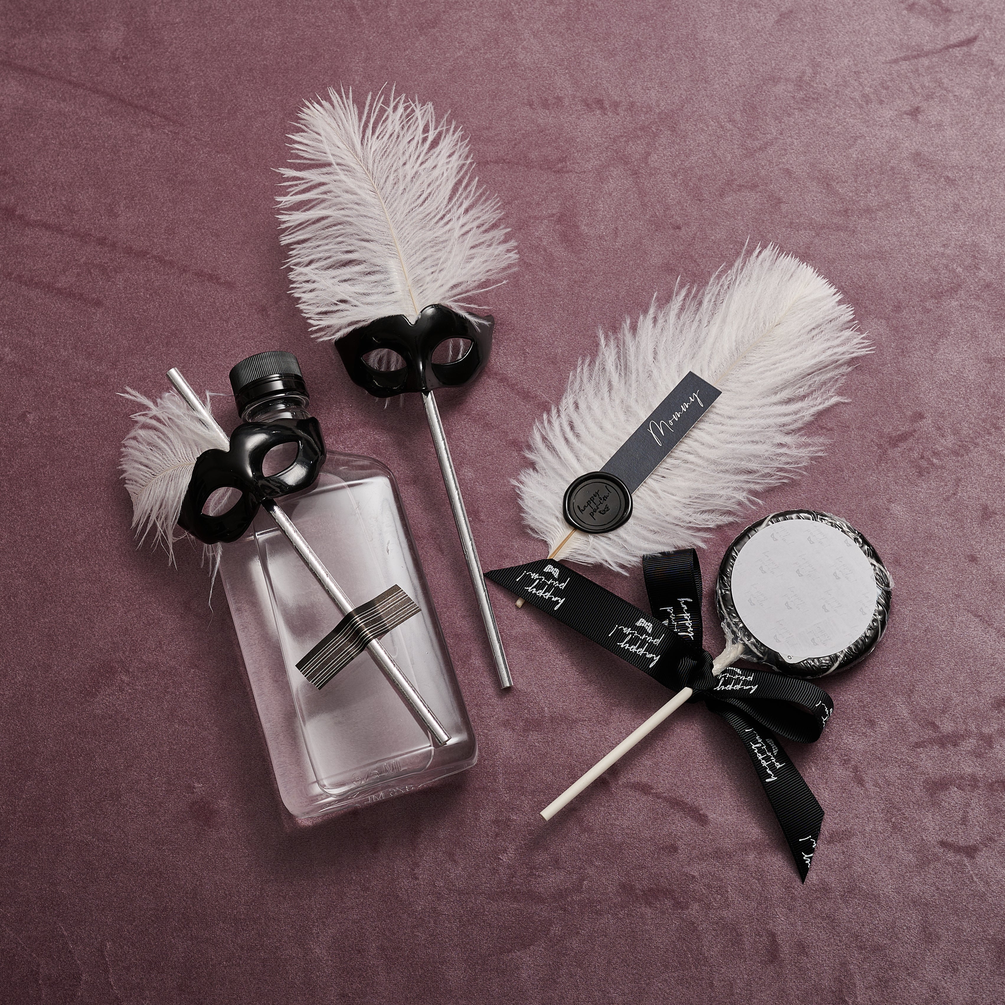 Feathery place cards with Purim wax seal